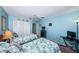 Guest bedroom with twin beds and built in closet at 5969 Terrace Park N Dr # 304, St Petersburg, FL 33709
