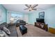 Living room with balcony access at 5969 Terrace Park N Dr # 304, St Petersburg, FL 33709