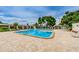 Two inviting pools with spacious deck and lounge chairs at 5969 Terrace Park N Dr # 304, St Petersburg, FL 33709