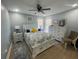 Bright bedroom with ceiling fan, and ample storage at 1223 Queen Anne Dr # C, Palm Harbor, FL 34684