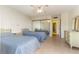 Bright bedroom with two twin beds and mirrored closet doors at 1380 Gulf Blvd # 307, Clearwater Beach, FL 33767