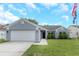 Image 1 of 68: 1526 River Oaks Dr, Tarpon Springs