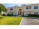 Condo building with stairs and landscaping at 6131 Bahia Del Mar Blvd # 236, St Petersburg, FL 33715
