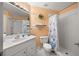 Clean bathroom with shower, toilet and vanity at 6131 Bahia Del Mar Blvd # 236, St Petersburg, FL 33715