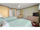 Spacious guest bedroom with two twin beds and a TV at 6131 Bahia Del Mar Blvd # 236, St Petersburg, FL 33715