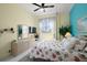 Bright main bedroom with king-size bed and dresser at 6131 Bahia Del Mar Blvd # 236, St Petersburg, FL 33715