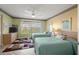 Guest bedroom with two twin beds and a dresser at 6131 Bahia Del Mar Blvd # 236, St Petersburg, FL 33715
