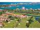 Aerial view showing property location within a community near golf course and water at 6131 Bahia Del Mar Blvd # 236, St Petersburg, FL 33715