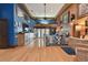 Spacious main bedroom with blue walls and wood floors at 3204 Polo Pl, Plant City, FL 33566