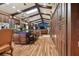 Open kitchen boasts a large island, hardwood floors, and ample storage at 3204 Polo Pl, Plant City, FL 33566