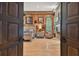 Main bedroom suite with hardwood floors and fireplace at 3204 Polo Pl, Plant City, FL 33566