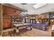 Elegant kitchen with custom cabinetry, a large island, and unique lighting at 3204 Polo Pl, Plant City, FL 33566