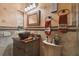Charming bathroom with copper sink, decorative tile, and updated fixtures at 3204 Polo Pl, Plant City, FL 33566