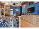 Main bedroom with large bed, built-in dresser, and hardwood floors at 3204 Polo Pl, Plant City, FL 33566