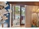 French doors open to a view of the relaxing pool area at 3204 Polo Pl, Plant City, FL 33566