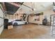Spacious garage with overhead storage and ample workbenches at 3204 Polo Pl, Plant City, FL 33566
