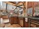 Spacious kitchen with island, stainless steel appliances, and custom cabinetry at 3204 Polo Pl, Plant City, FL 33566