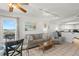 Living room features sofa, dining area, and kitchen access at 4510 Gulf Blvd # 508, St Pete Beach, FL 33706