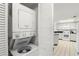 Compact laundry closet with stackable washer and dryer at 4510 Gulf Blvd # 508, St Pete Beach, FL 33706