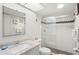 Clean bathroom with walk-in shower and granite vanity at 4510 Gulf Blvd # 508, St Pete Beach, FL 33706