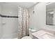 Updated bathroom, shower/tub, granite vanity, and tile flooring at 4510 Gulf Blvd # 508, St Pete Beach, FL 33706