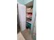 Bathroom closet with shelving and storage at 9901 111Th Ln, Seminole, FL 33772