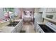 Open kitchen with view of dining area, double sink, and appliances at 9901 111Th Ln, Seminole, FL 33772