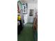 Laundry room with water heater, ladder, and boxes at 9901 111Th Ln, Seminole, FL 33772