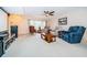 Spacious living room with comfy seating and large windows at 2228 Swedish Dr # 42, Clearwater, FL 33763
