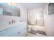 Updated bathroom featuring a vanity with marble countertop and a shower-tub combo at 2228 Swedish Dr # 42, Clearwater, FL 33763