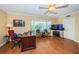 Home office with wood desk and comfortable seating at 2228 Swedish Dr # 42, Clearwater, FL 33763