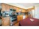 Modern kitchen with granite countertops and wood cabinets at 2228 Swedish Dr # 42, Clearwater, FL 33763