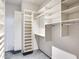 Spacious walk-in closet with custom shelving and hanging space at 3425 Overlook Ne Dr, St Petersburg, FL 33703