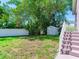 Backyard with shed and grassy area at 3425 Overlook Ne Dr, St Petersburg, FL 33703