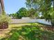 Spacious backyard with lush lawn and privacy fence at 3425 Overlook Ne Dr, St Petersburg, FL 33703