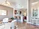 Open concept living room with adjacent kitchen and breakfast bar at 3425 Overlook Ne Dr, St Petersburg, FL 33703