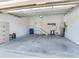 Garage with storage space and staircase to upper level at 3425 Overlook Ne Dr, St Petersburg, FL 33703