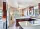 Open concept kitchen with island and stainless steel appliances at 3425 Overlook Ne Dr, St Petersburg, FL 33703