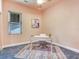 Bright home office with a desk, chair and large window at 3425 Overlook Ne Dr, St Petersburg, FL 33703