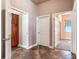 Home hallway with tile floors and access to multiple rooms at 3425 Overlook Ne Dr, St Petersburg, FL 33703