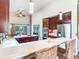 Modern kitchen with dark wood cabinets and breakfast bar at 3425 Overlook Ne Dr, St Petersburg, FL 33703