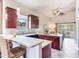 Modern kitchen with a breakfast bar and stainless steel appliances at 3425 Overlook Ne Dr, St Petersburg, FL 33703