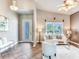 Bright living room with white furniture and large windows at 3425 Overlook Ne Dr, St Petersburg, FL 33703