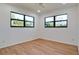 Spacious bedroom with wood flooring and large windows at 4216 La Costa Cv # 4216, Bradenton, FL 34210