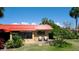 Condo exterior showcasing a patio with seating and landscaping at 4216 La Costa Cv # 4216, Bradenton, FL 34210