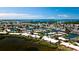 Aerial view of waterfront community with lush landscaping and private docks at 4216 La Costa Cv # 4216, Bradenton, FL 34210