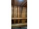 Well-maintained locker room with wooden benches and walls at 4216 La Costa Cv # 4216, Bradenton, FL 34210