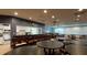 Community room with tables, chairs, and kitchen area at 4216 La Costa Cv # 4216, Bradenton, FL 34210