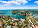 Aerial view of waterfront community and surrounding area at 138 1St E St # 106, Tierra Verde, FL 33715