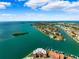 Wide view of waterfront property and neighborhood at 138 1St E St # 106, Tierra Verde, FL 33715
